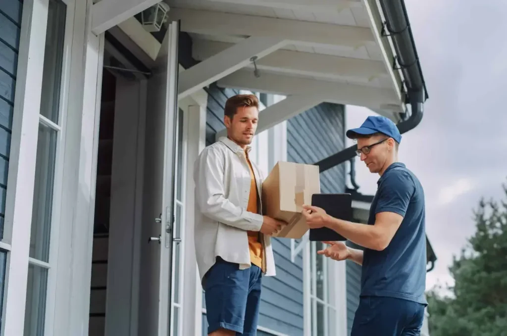 local delivery New York driver loading a package